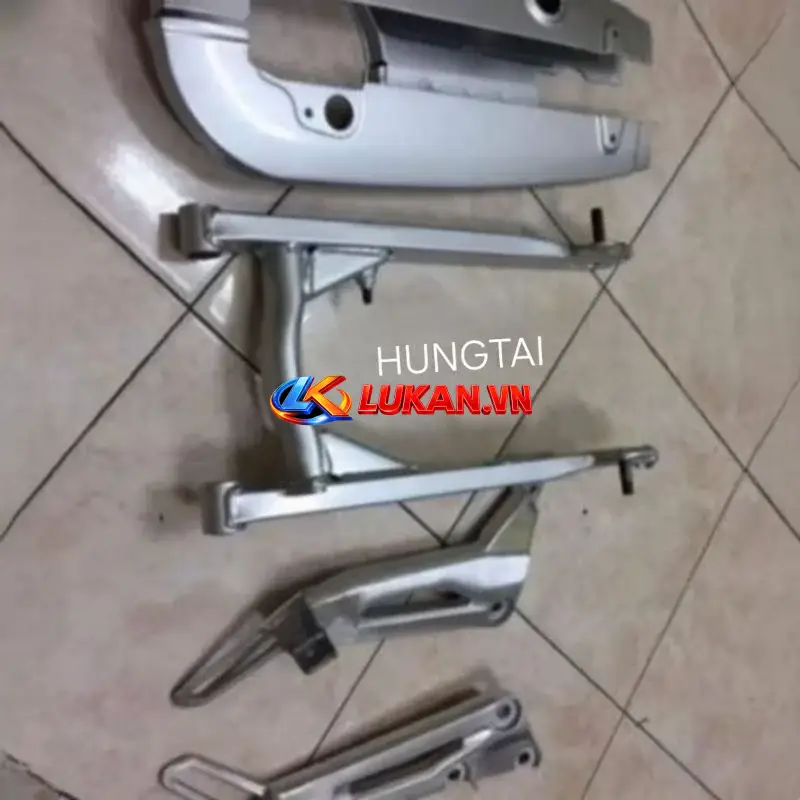 Bộ càng gắp, hộp xích cacte xe Super DREAM zin Honda