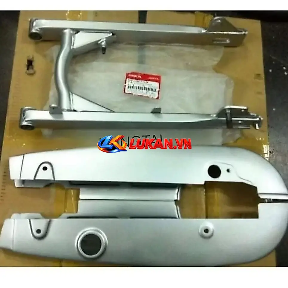 Bộ càng gắp hộp xích, sên cacte xe Super DREAM zin Honda
